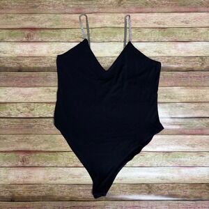 Black body suit with rhinestone straps. Item 284